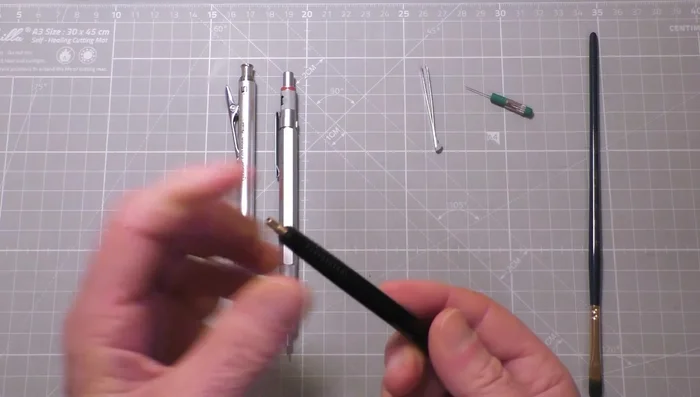 Kupplung öffnen und Mine einsetzen, bevor Konus wieder verschraubt wird.