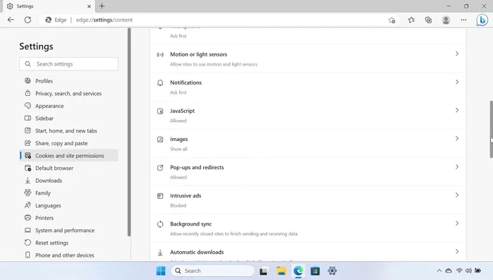 Scrollen Sie nach unten und wählen Sie 'Pop-ups und Weiterleitungen'.